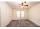 Bedroom with ceiling fan and double hung window at 602 W 6Th St, Newton, NC 28658