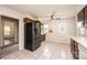 Functional kitchen with tiled floor, and stainless steel refrigerator at 602 W 6Th St, Newton, NC 28658