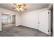 Cozy living room with connecting rooms and neutral walls and carpet at 602 W 6Th St, Newton, NC 28658