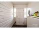 Mud Room with a door to the backyard and window at 602 W 6Th St, Newton, NC 28658