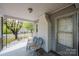 Cozy covered porch with chairs, offering a relaxing outdoor seating area at 602 W 6Th St, Newton, NC 28658