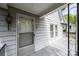 Covered porch with a screen door, providing a comfortable transition from outside to inside at 602 W 6Th St, Newton, NC 28658