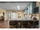 Inviting kitchen features granite countertops, blue cabinets, and a view to the living room at 6325 Yount Dr, Salisbury, NC 28147