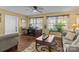 Comfortable living room featuring wooden floors, two couches, and lots of natural lighting at 6325 Yount Dr, Salisbury, NC 28147