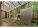 Cozy backyard with a covered patio, storage shed and stone landscaping at 652 Camrose Ne Cir, Concord, NC 28025