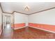 Spacious bedroom featuring crown molding, hardwood flooring, and natural light at 652 Camrose Ne Cir, Concord, NC 28025