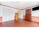 Bedroom with ample closet space, wood-style flooring, and a traditional aesthetic at 652 Camrose Ne Cir, Concord, NC 28025