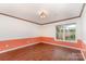 Spacious bedroom showcasing new floors, crown molding and natural light at 652 Camrose Ne Cir, Concord, NC 28025