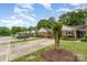 Charming brick townhomes with well-manicured lawns and mature landscaping at 652 Camrose Ne Cir, Concord, NC 28025