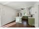 An eat-in kitchen features stainless appliances, updated fixtures, and a kitchen island at 6558 Covecreek Dr, Charlotte, NC 28215