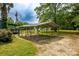 Spacious open carport with gravel base, offering convenient covered parking at 7041 Kays Dr, York, SC 29745