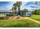 Inviting exterior view featuring a carport, covered patio, and manicured lawn at 7041 Kays Dr, York, SC 29745