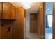 Hallway features wood paneling, overhead lighting, and access to other rooms at 7041 Kays Dr, York, SC 29745