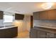 Functional kitchen featuring dark cabinets, ample counter space, and essential appliances at 7041 Kays Dr, York, SC 29745