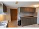 Well-organized kitchen featuring dark cabinets and plenty of counter space at 7041 Kays Dr, York, SC 29745