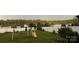 Spacious backyard with a white fence, mature trees, and a swing set for children at 79044 Ridgehaven Rd, Lancaster, SC 29720