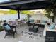 Outdoor living space featuring a covered patio, dining set, and comfortable seating at 79044 Ridgehaven Rd, Lancaster, SC 29720