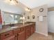 Bathroom with double vanity, granite countertops, a garden tub, and a glass enclosed shower at 79044 Ridgehaven Rd, Lancaster, SC 29720