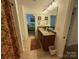 Bathroom featuring double sinks, granite countertops and a glimpse into a bedroom at 79044 Ridgehaven Rd, Lancaster, SC 29720