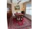 Traditional dining room with dark wood furniture, chandelier and a large area rug at 79044 Ridgehaven Rd, Lancaster, SC 29720