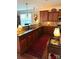 Kitchen boasts ample counter space, wood cabinets, stainless appliances and a window view at 79044 Ridgehaven Rd, Lancaster, SC 29720