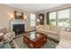 Inviting living room features a fireplace, comfortable seating, and a large glass coffee table at 79044 Ridgehaven Rd, Lancaster, SC 29720