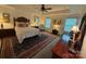 Spacious main bedroom featuring tray ceiling, neutral decor and ample natural lighting at 79044 Ridgehaven Rd, Lancaster, SC 29720