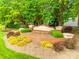 Beautifully landscaped community sign with vibrant plants and lush greenery at 8120 Calistoga Ln, Waxhaw, NC 28173