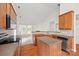 Well-equipped kitchen featuring modern appliances, island, and a breakfast bar at 8120 Calistoga Ln, Waxhaw, NC 28173