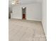Open living room featuring neutral walls, plush carpet, and a ceiling fan at 8120 Calistoga Ln, Waxhaw, NC 28173
