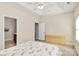 Spacious bedroom with tray ceiling, neutral decor, and ample storage with a dresser at 8200 Park Vista Cir, Charlotte, NC 28226