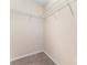 A simple closet includes shelving, offering a practical storage solution at 827 Gentlewinds Ct, Fort Mill, SC 29708