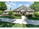 Attractive clubhouse with stone accents, lush landscaping, and welcoming entrance at 827 Gentlewinds Ct, Fort Mill, SC 29708