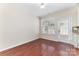 Cozy dining area with hardwood floors and a bright window at 827 Gentlewinds Ct, Fort Mill, SC 29708