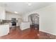 Open kitchen features stainless appliances, ample counter space, and access to the living spaces at 827 Gentlewinds Ct, Fort Mill, SC 29708