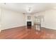 Expansive living room featuring a fireplace and seamless transition to the kitchen at 827 Gentlewinds Ct, Fort Mill, SC 29708