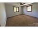 A spacious bedroom with carpet flooring and plenty of natural light at 8588 Smith Rd, Kannapolis, NC 28081
