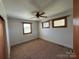 Spacious bedroom with carpet flooring, natural light and a ceiling fan at 8588 Smith Rd, Kannapolis, NC 28081