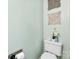 Bathroom with toilet, medicine cabinet, and decorative wall art at 8814 Gerren Ct, Charlotte, NC 28217