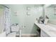 En suite bathroom with vanity, tub-shower combo, and decorative wall art at 8814 Gerren Ct, Charlotte, NC 28217