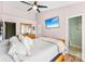 Primary bedroom with en suite bathroom and ceiling fan at 8814 Gerren Ct, Charlotte, NC 28217