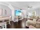 Bright, airy living area with a large sectional and dining area at 8814 Gerren Ct, Charlotte, NC 28217