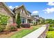 Charming brick home with a welcoming front porch and beautiful landscaping in a well-maintained community at 9319 Highclere Ct, Matthews, NC 28105