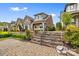 Beautiful homes line the street with mature landscaping and inviting curb appeal at 9319 Highclere Ct, Matthews, NC 28105