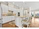 Bright kitchen features white cabinetry, granite countertops, and stainless steel appliances at 9319 Highclere Ct, Matthews, NC 28105
