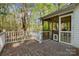 This back deck is a great space to entertain with its beautiful view of the property's wooded backyard at 118 Taylor Ct # 16, Mooresville, NC 28117
