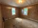 Cozy bedroom with carpeted floor and natural light from two windows at 135 Hendren Ln, Hiddenite, NC 28636