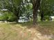 Beautiful home surrounded by mature trees, with a spacious yard and convenient front ramp at 135 Hendren Ln, Hiddenite, NC 28636