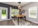 Dining area with hardwood floors, bright windows, and modern decor at 135 Westerwood Dr, Rock Hill, SC 29732