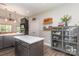 Open-concept kitchen featuring a center island, modern appliances, and seamless access to the dining area at 135 Westerwood Dr, Rock Hill, SC 29732